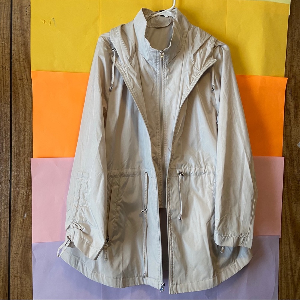 Light grey windbreaker